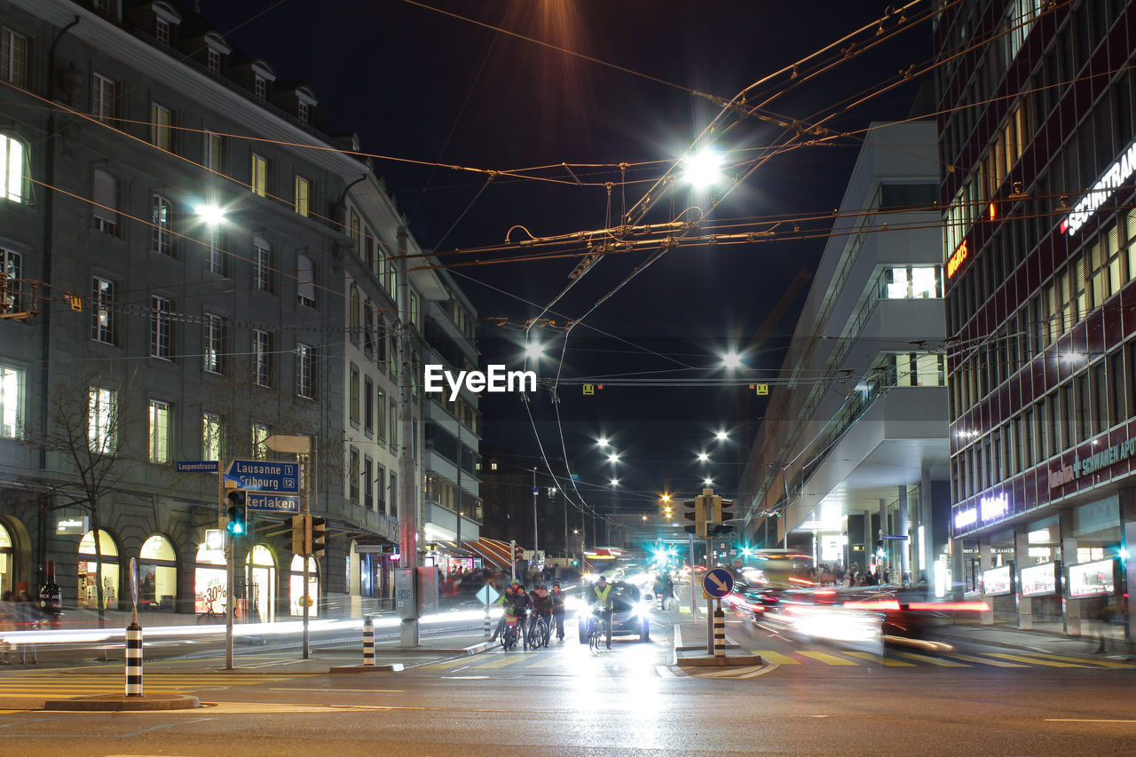 ILLUMINATED STREET AT NIGHT