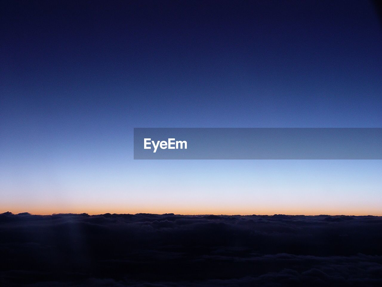 SCENIC VIEW OF SILHOUETTE MOUNTAIN AGAINST CLEAR SKY