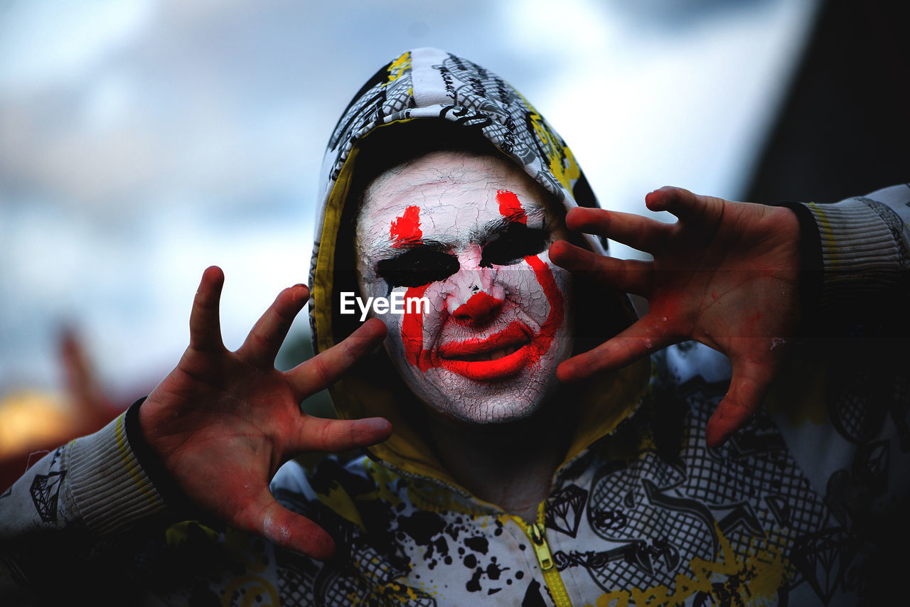 Close-up of boy with face paint