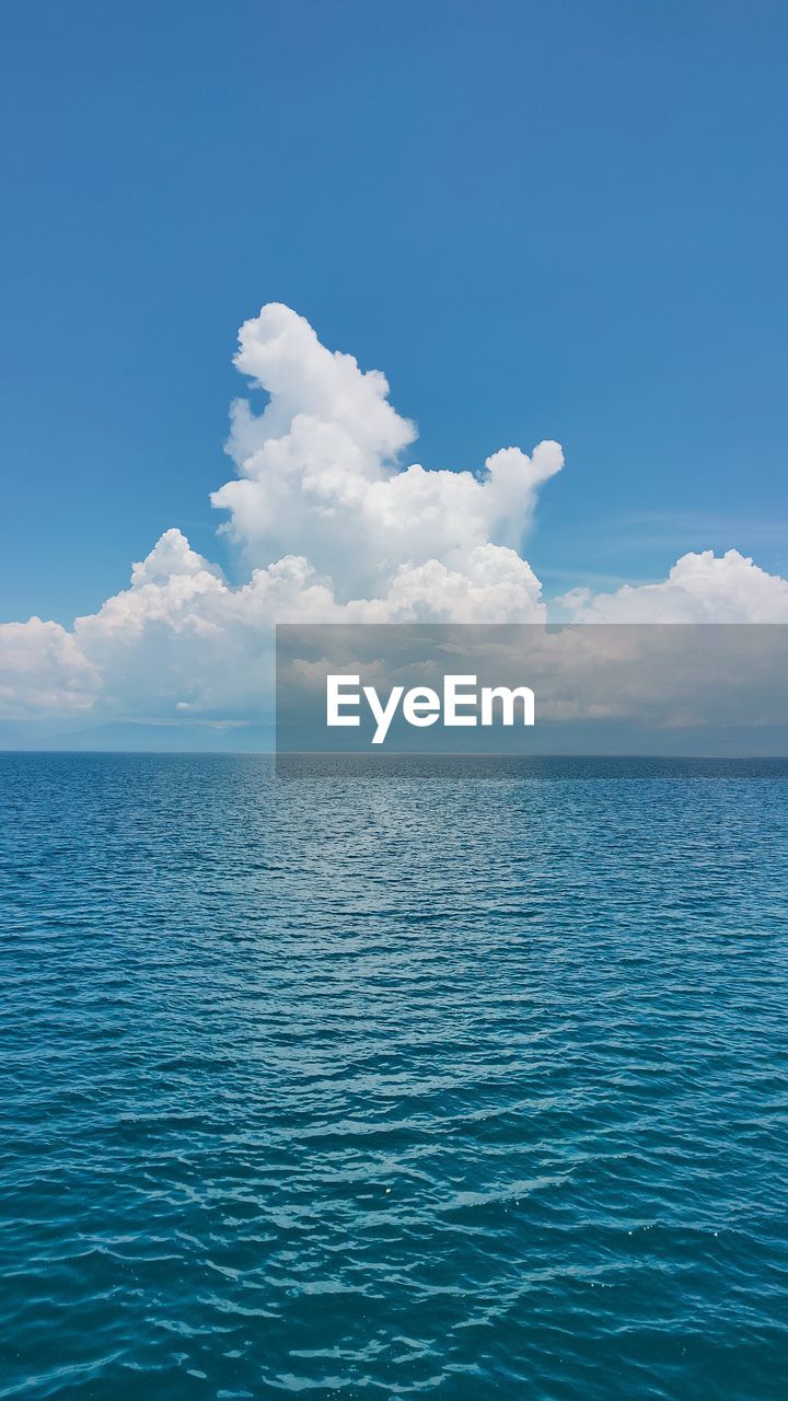 sky, water, horizon, blue, sea, cloud, beauty in nature, ocean, scenics - nature, nature, tranquility, tranquil scene, azure, idyllic, travel, horizon over water, no people, day, environment, outdoors, seascape, body of water, holiday, travel destinations, vacation, land, trip, coast, summer, landscape, copy space, tourism, rippled, backgrounds