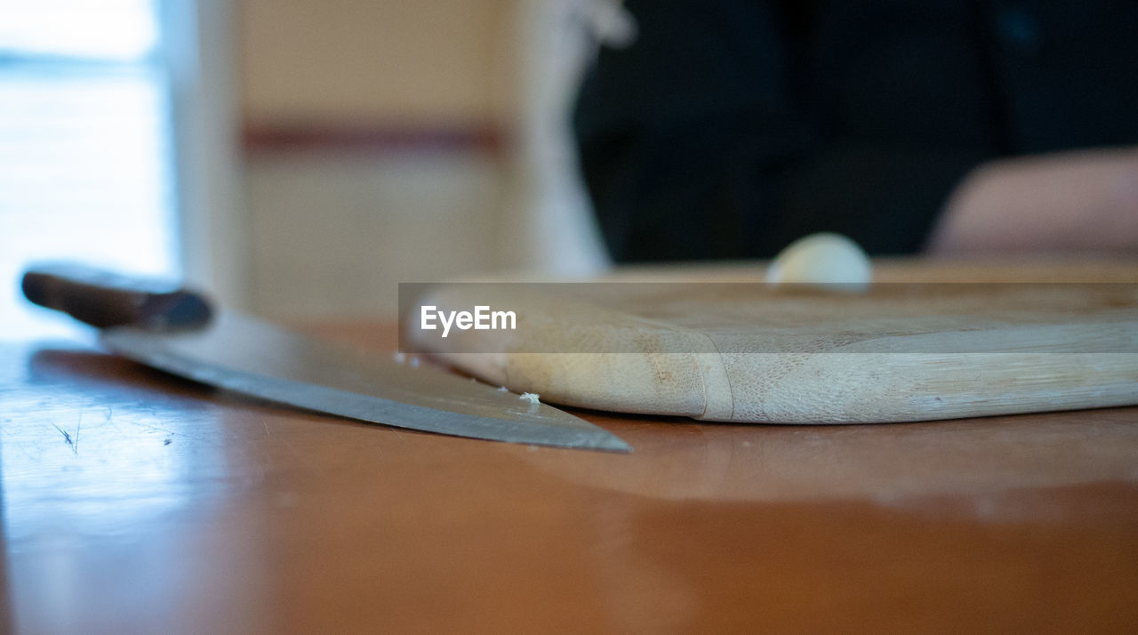 CLOSE-UP OF COFFEE CUP ON TABLE