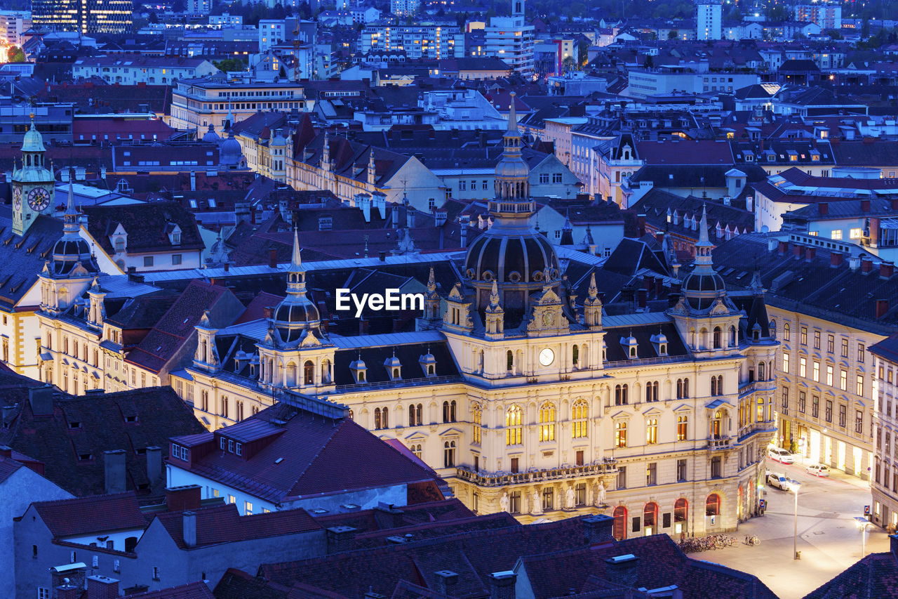 high angle view of illuminated buildings in city