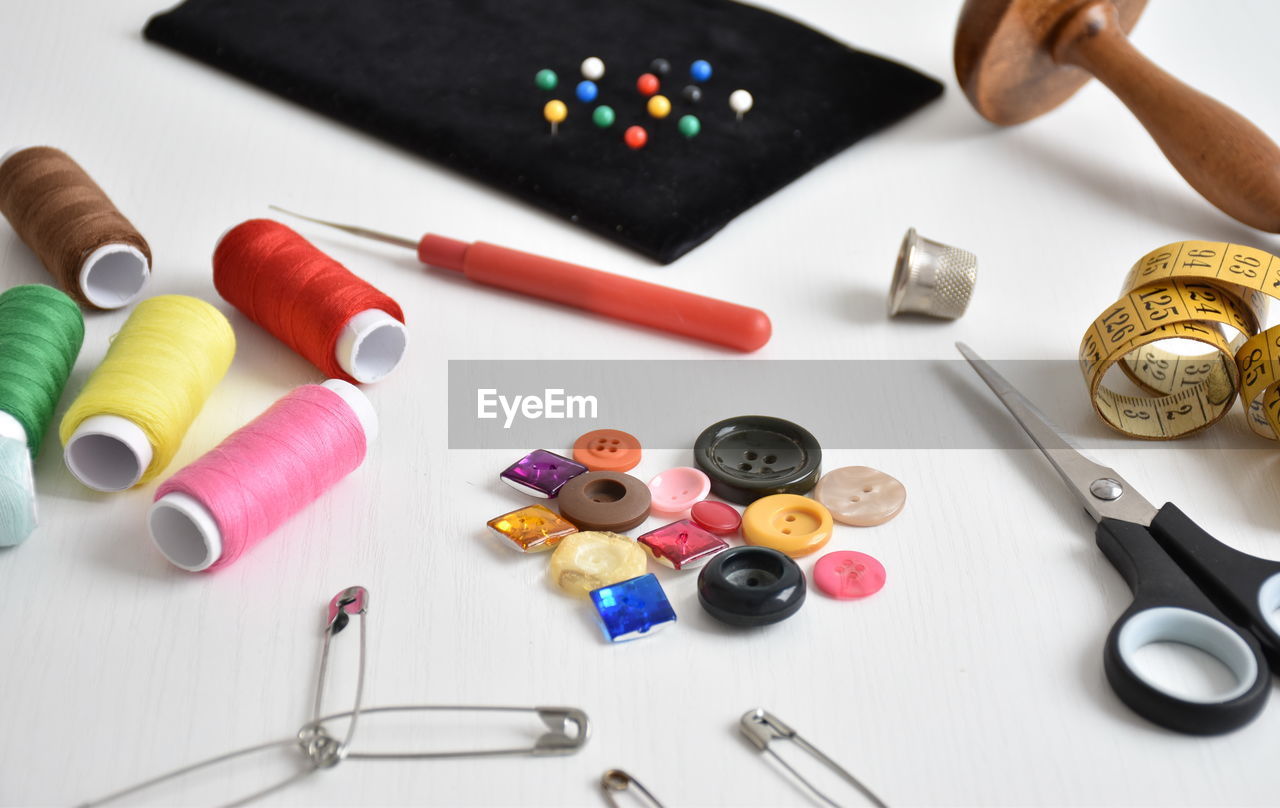 Close-up of sewing items on table