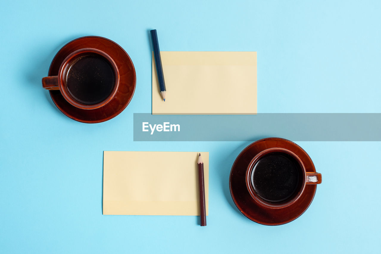 High angle view of coffee cup on table