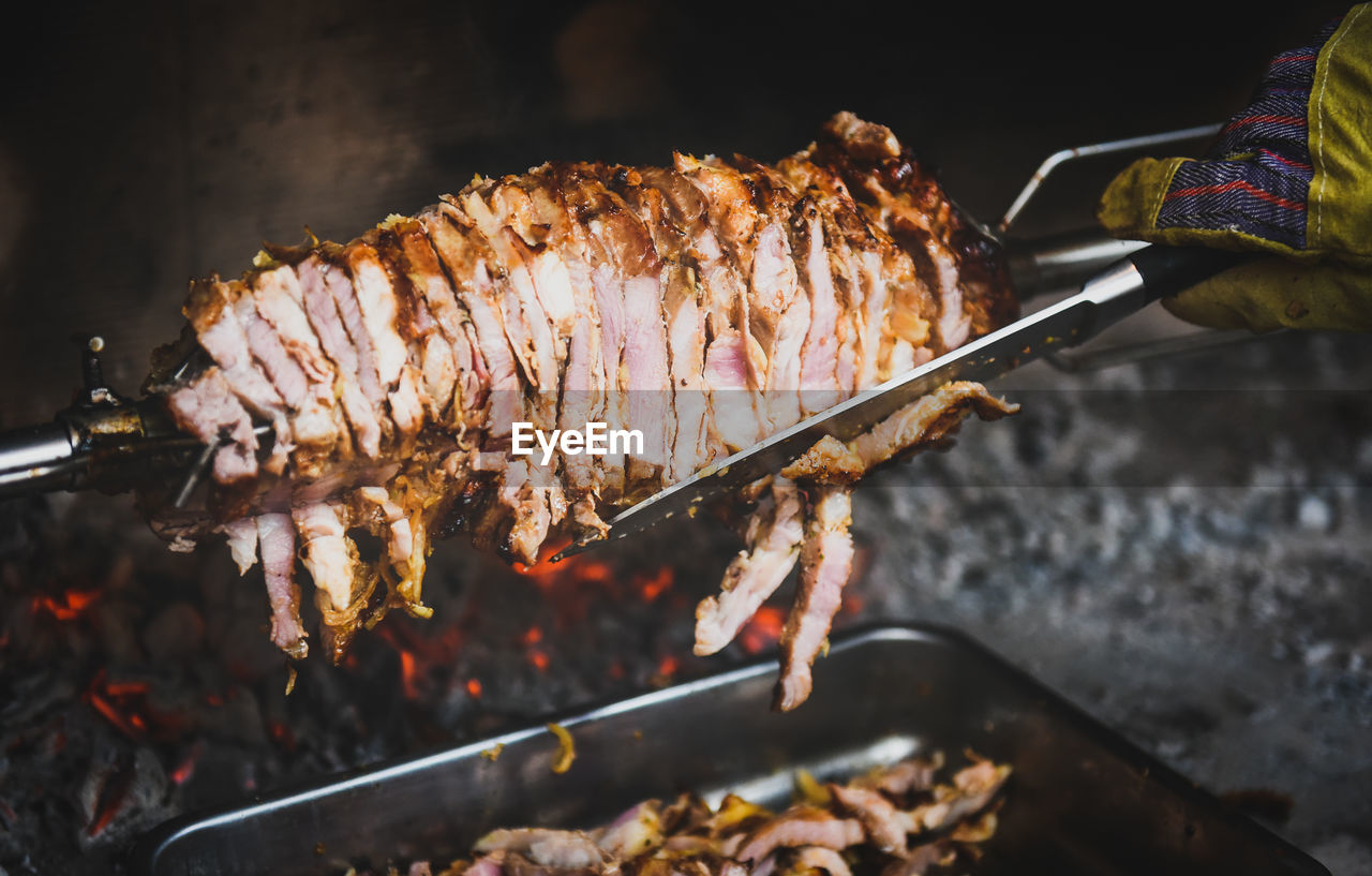 High angle view of meat on barbecue grill