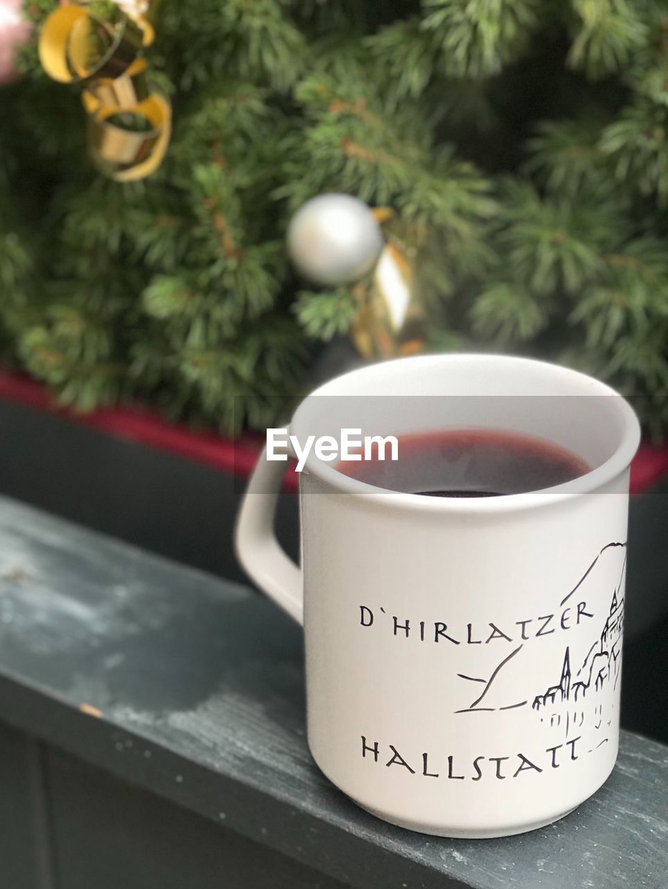 CLOSE-UP OF COFFEE CUP ON TABLE