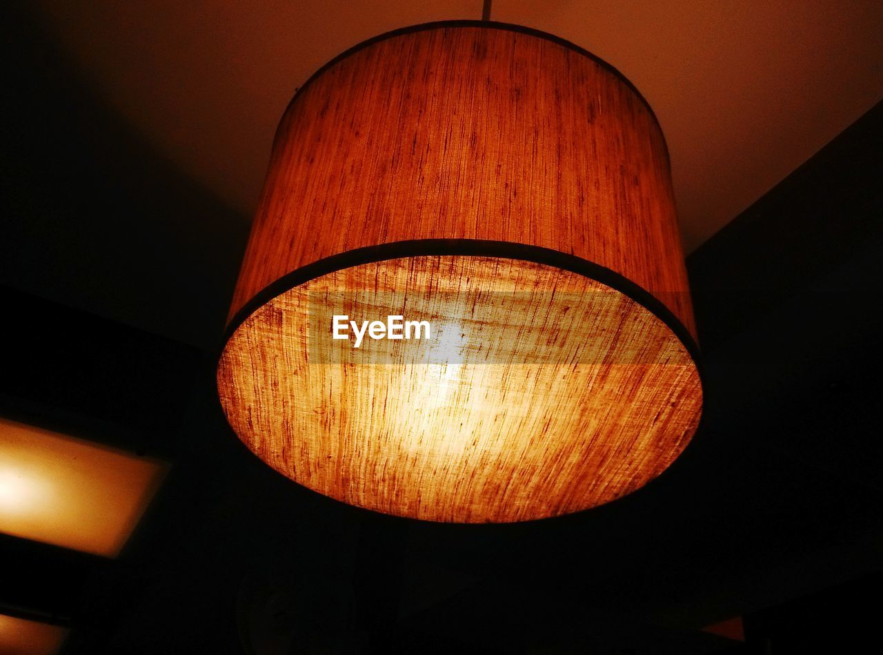 LOW ANGLE VIEW OF LIT LAMP