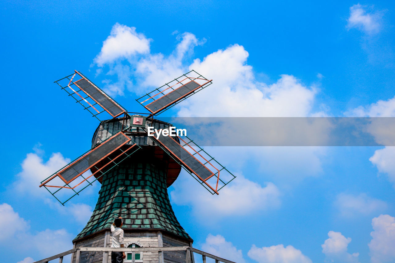 LOW ANGLE VIEW OF WINDMILL AGAINST SKY