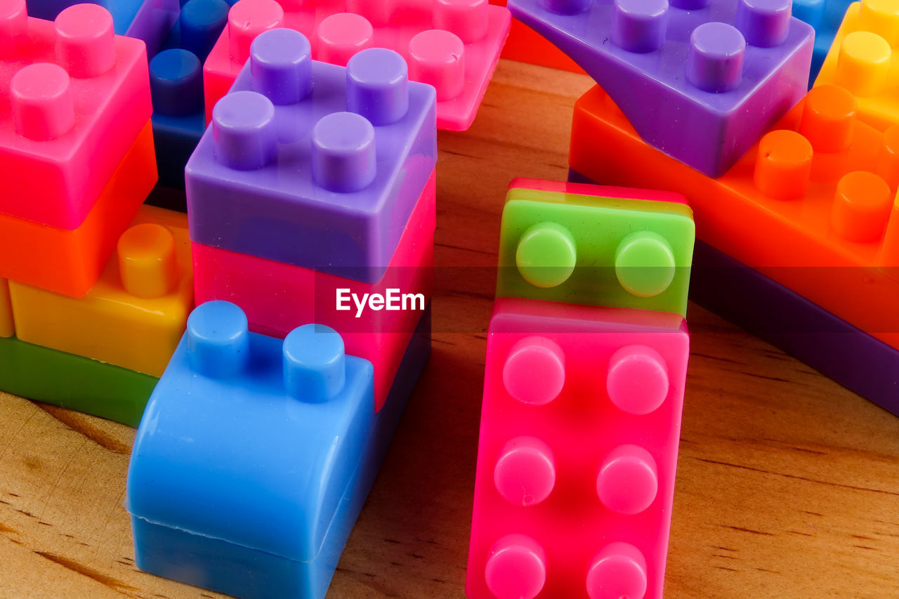 Close-up of toy blocks on wooden table