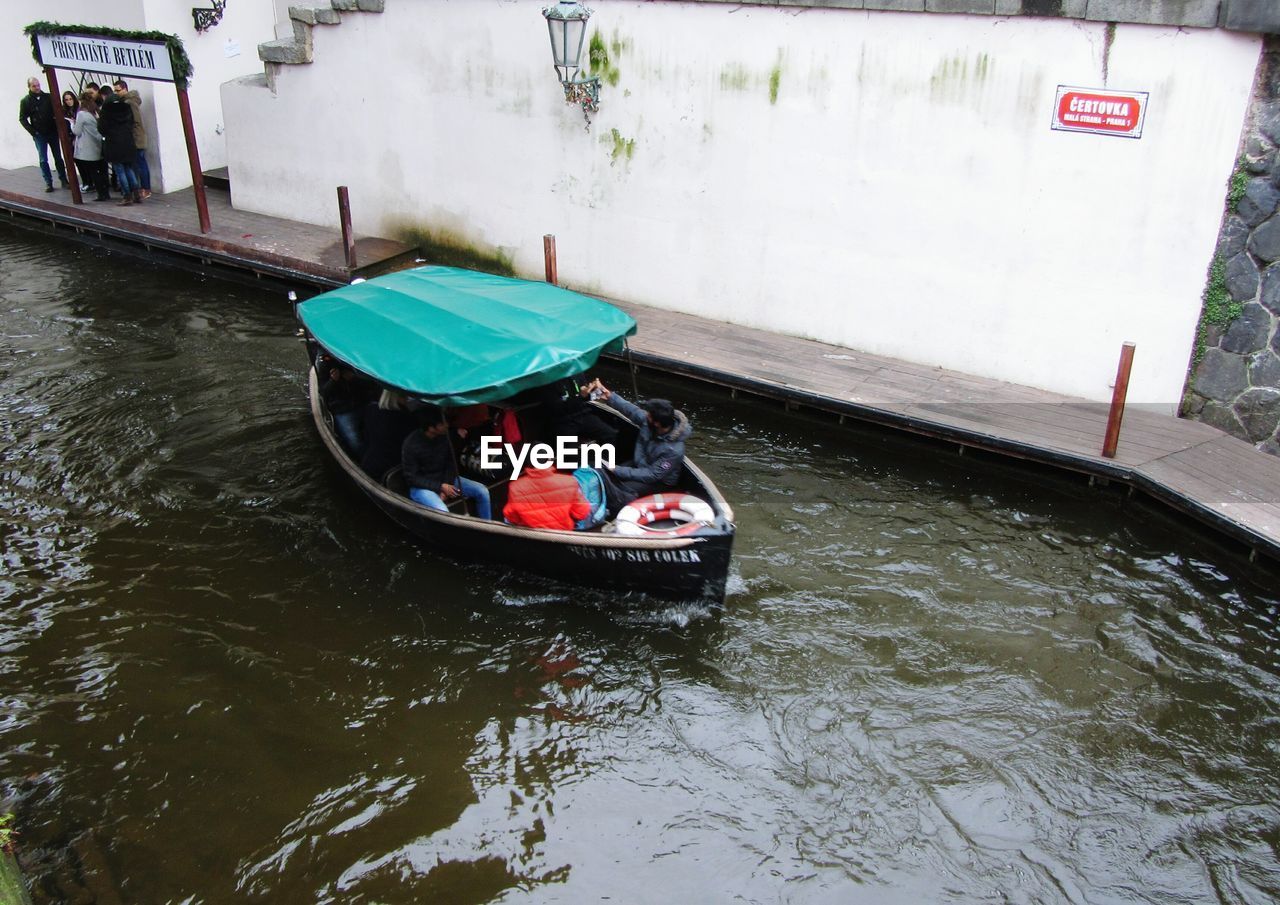 HIGH ANGLE VIEW OF PEOPLE IN WATER