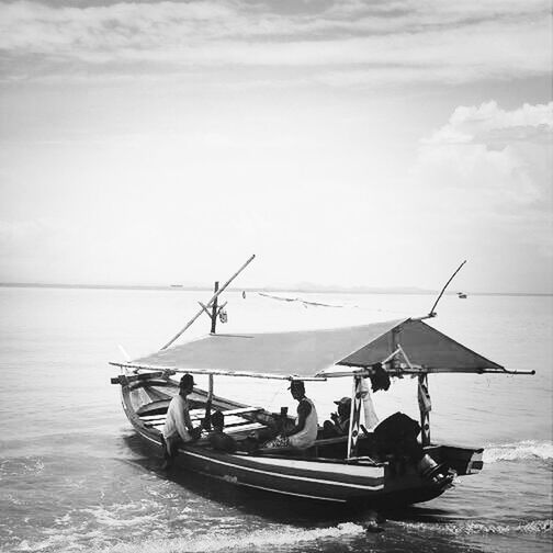 VIEW OF BOATS IN SEA