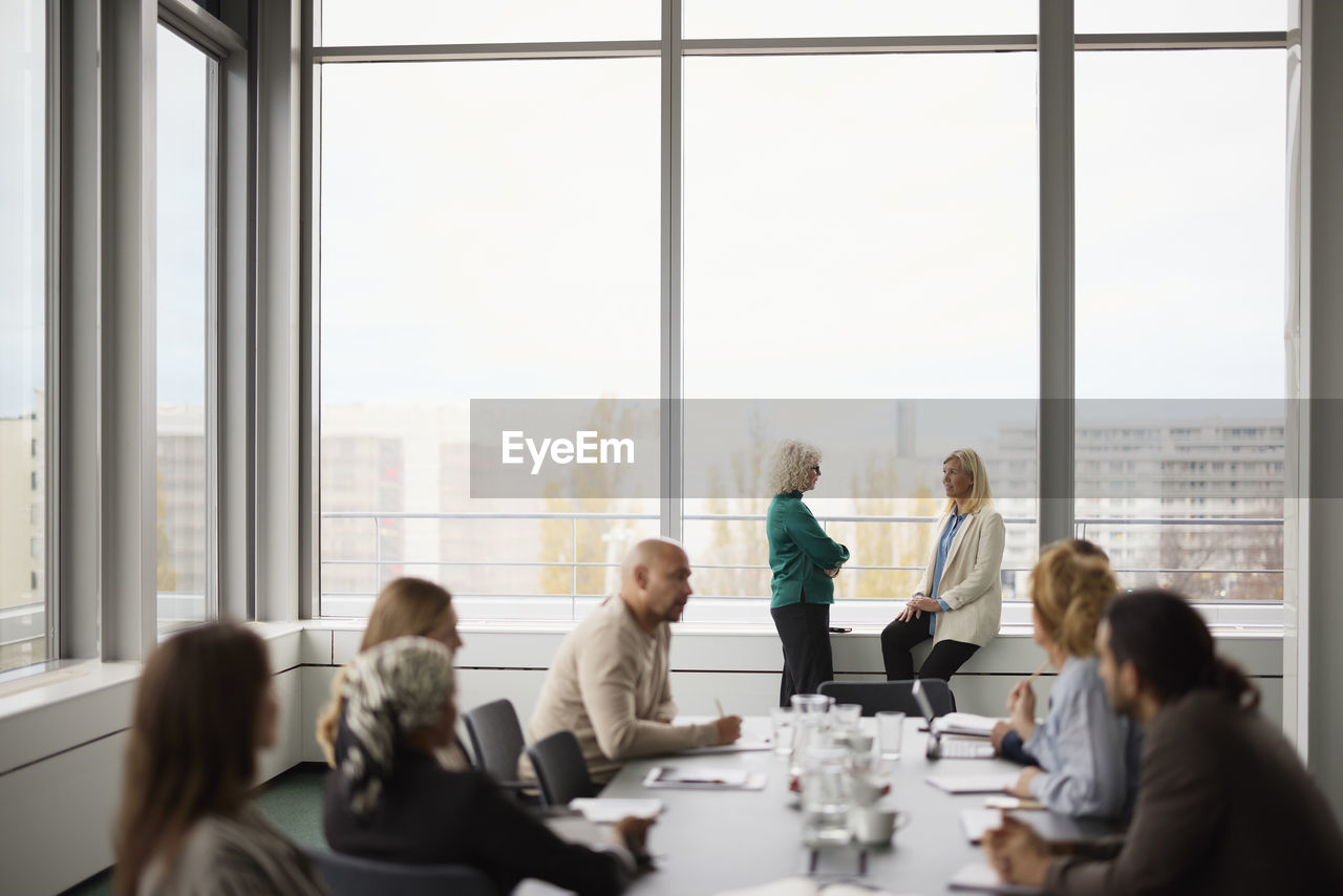 People talking during business meeting