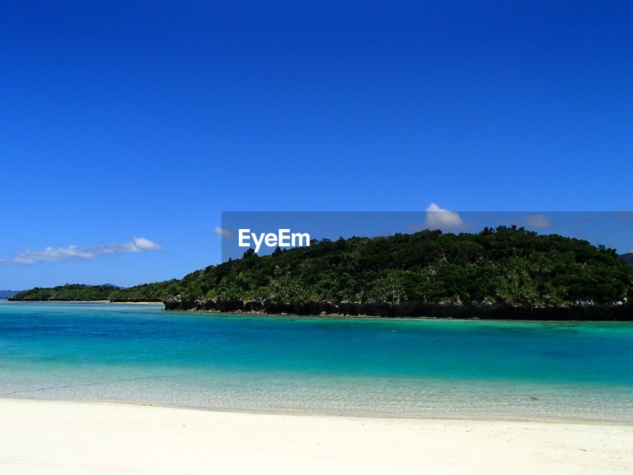 TRANQUIL SCENE OF CALM BEACH