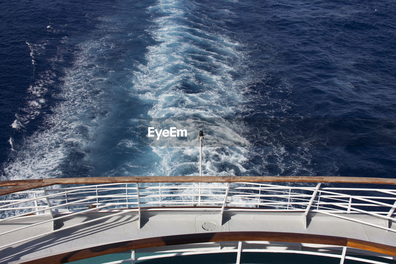 High angle view of ship sailing in sea