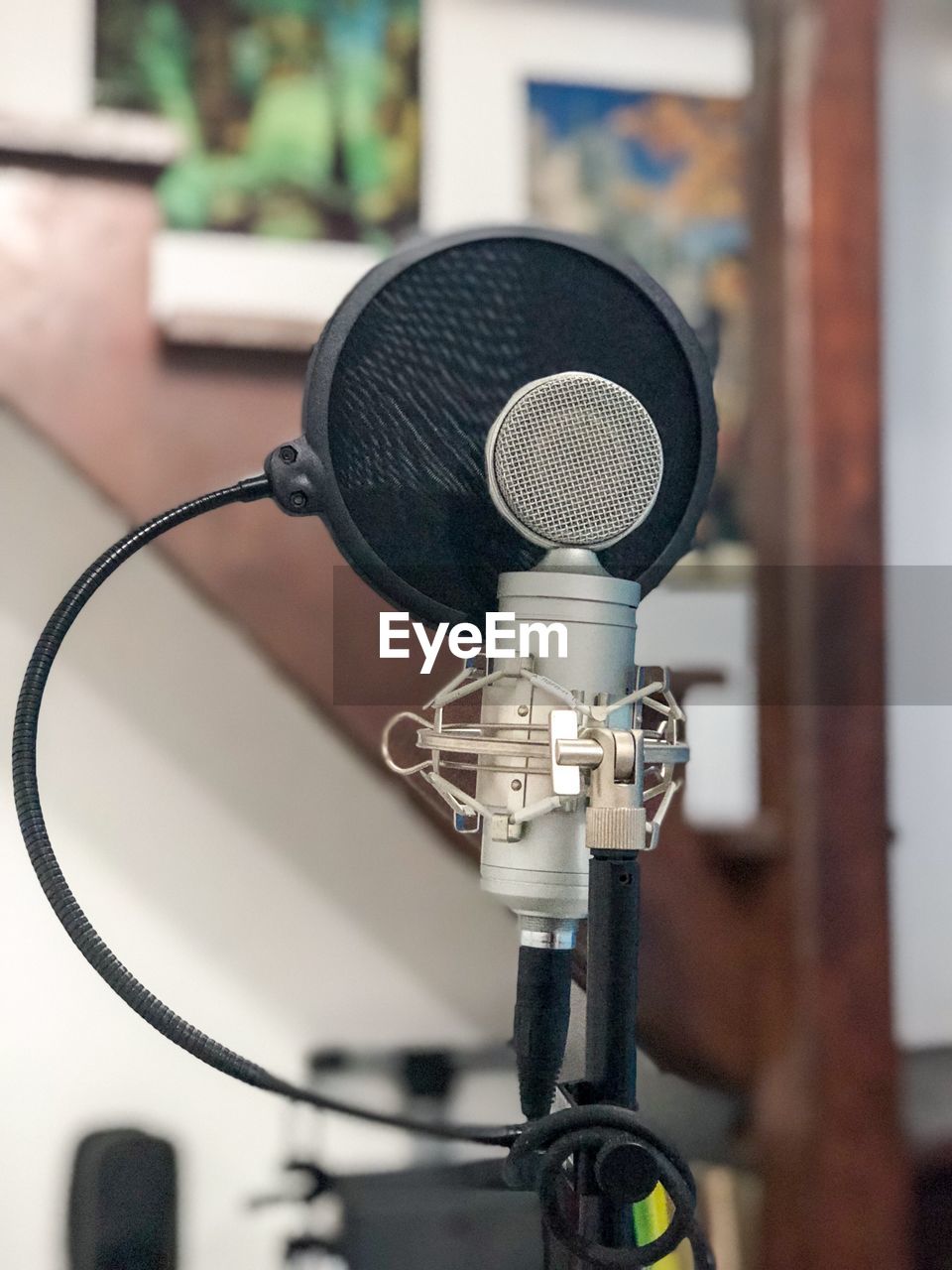 Close-up of microphone in recording studio