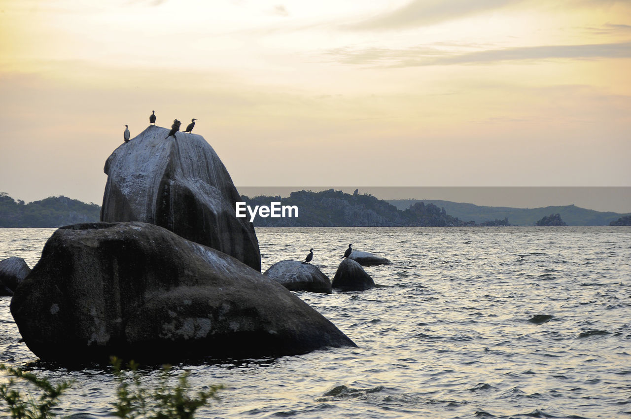 Scenic view of sea against sky during sunset