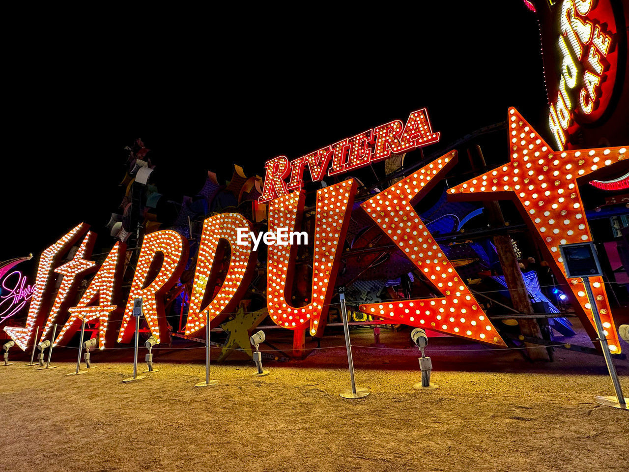illuminated, night, text, christmas lights, lighting equipment, christmas decoration, no people, communication, celebration, neon, western script, architecture, decoration, nature, holiday, sign, outdoors, red, arts culture and entertainment, sky, multi colored, travel destinations, glowing, building exterior, built structure, city