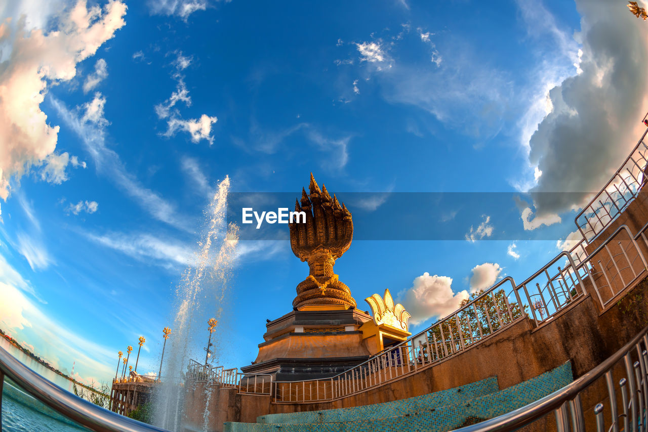 Low angle view of statue against building