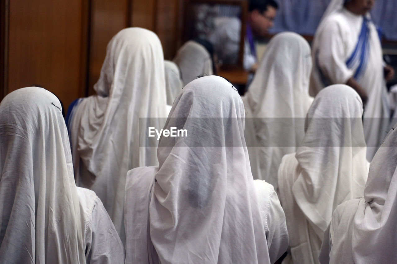 PEOPLE IN TEMPLE