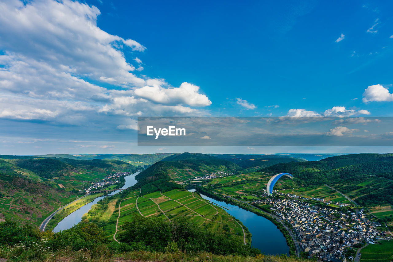 Paragliding over the moselle vineyards, germany.