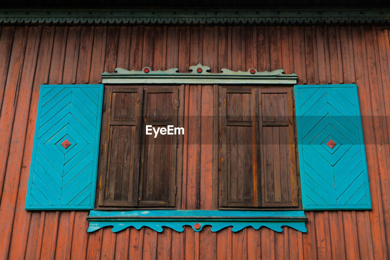 Closed wooden window of house