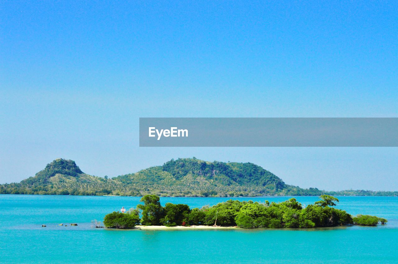 Scenic view of sea against clear blue sky in indonesia