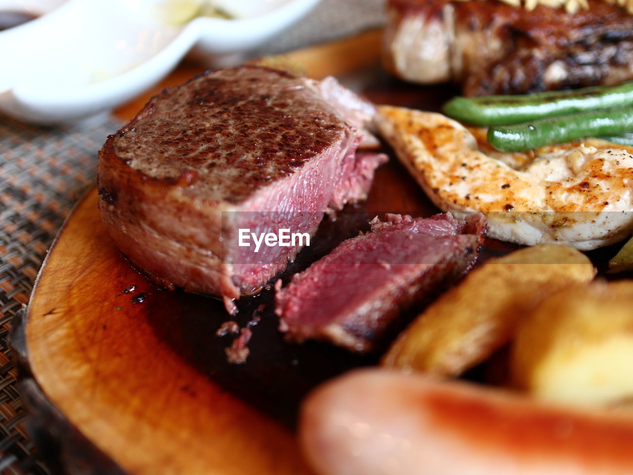 CLOSE-UP OF FOOD SERVED ON TABLE