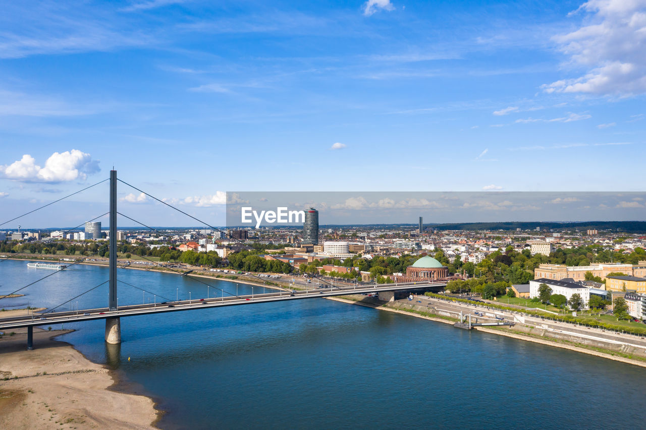 Bridge over the river rhine rheinkniebrücke in düsseldorf from a bird's eye view, drone photography