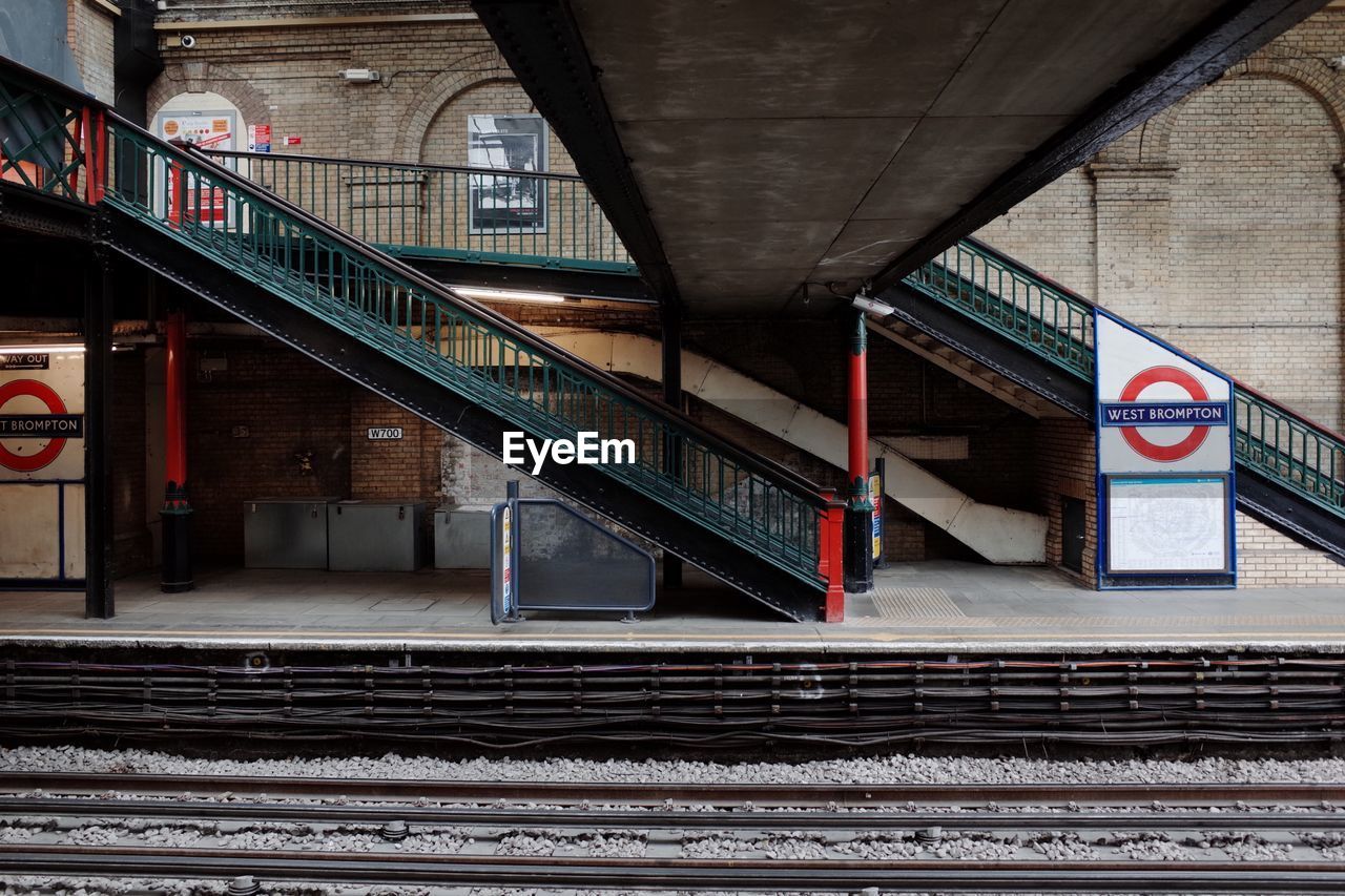 Bridge over railroad tracks at station