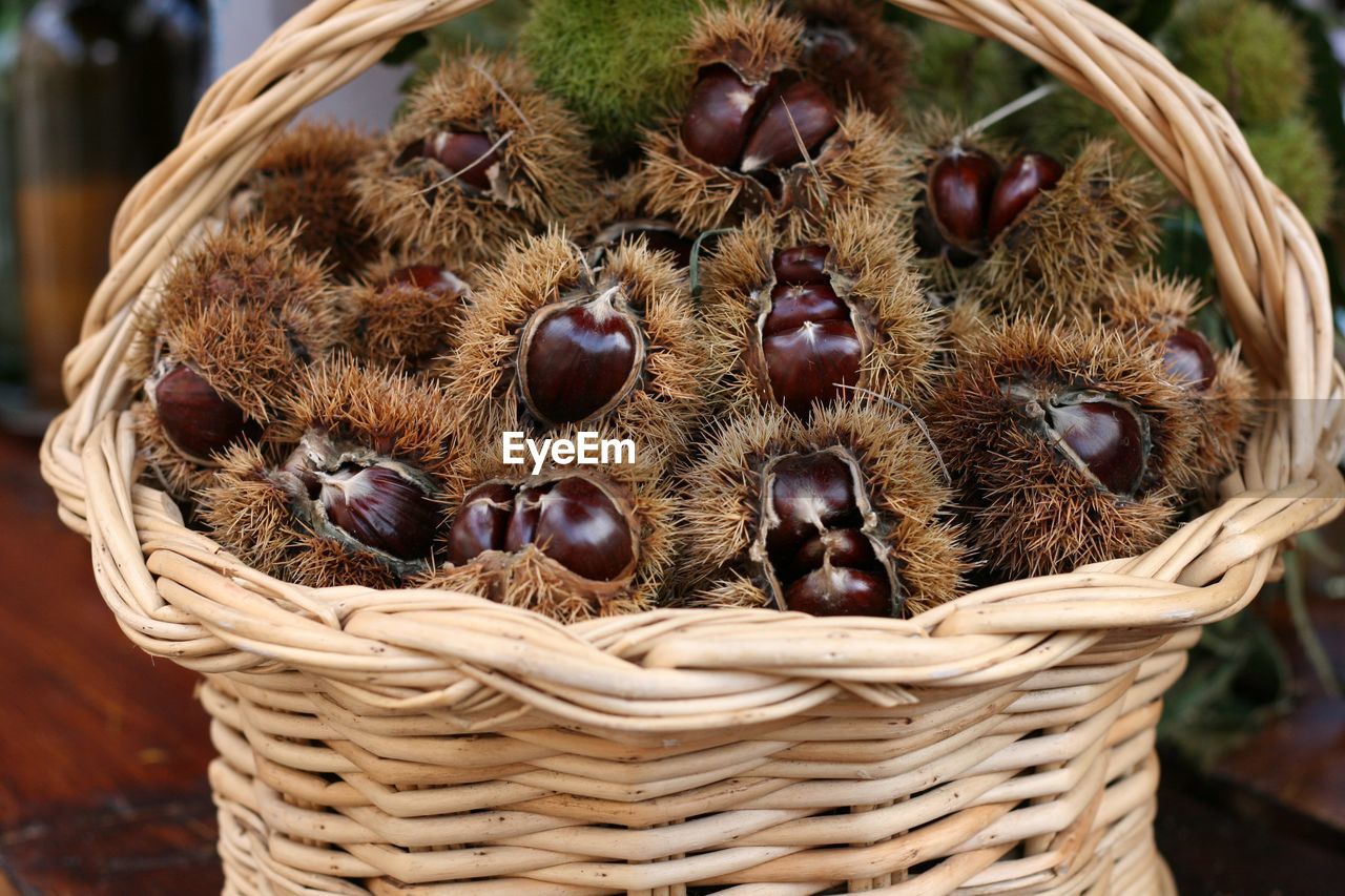 High angle view of chestnut in basket