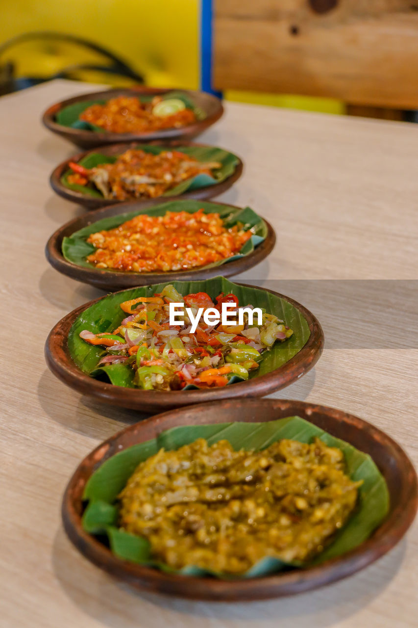 High angle view of chili sauce in plate on table