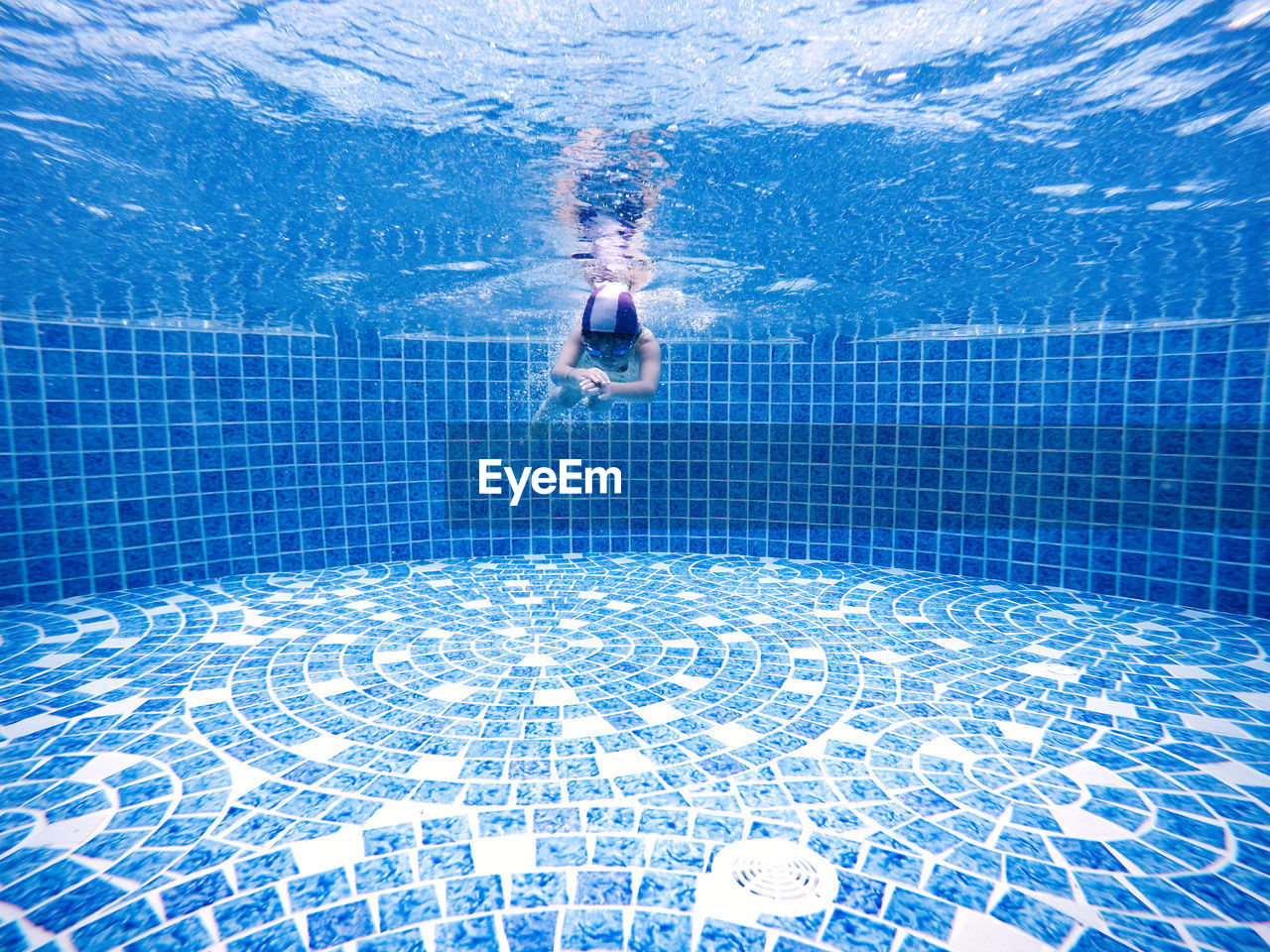 Girl swimming in pool