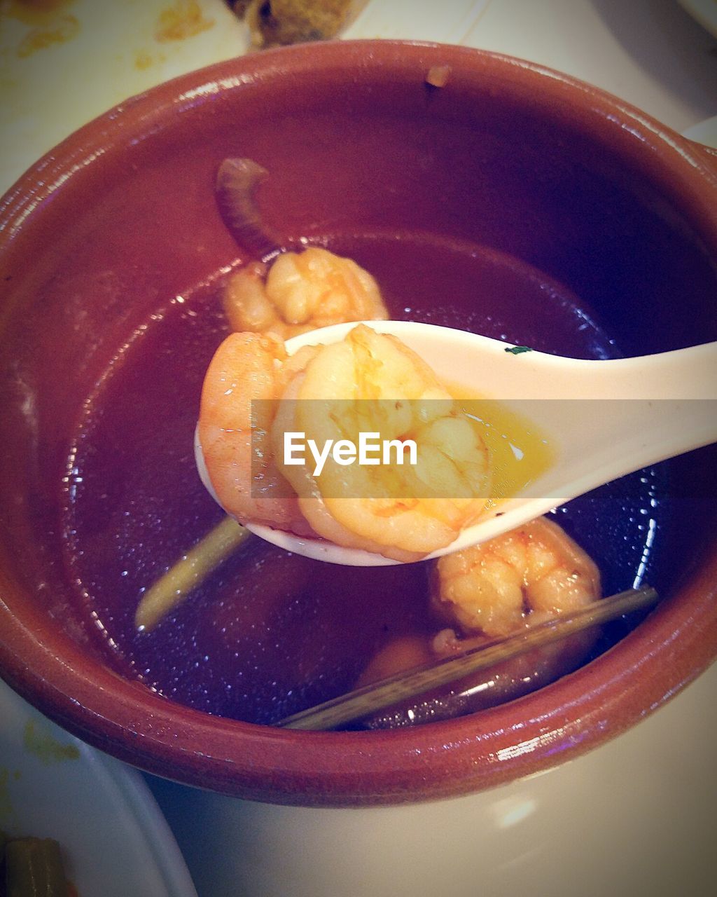 CLOSE-UP OF SOUP WITH BOWL