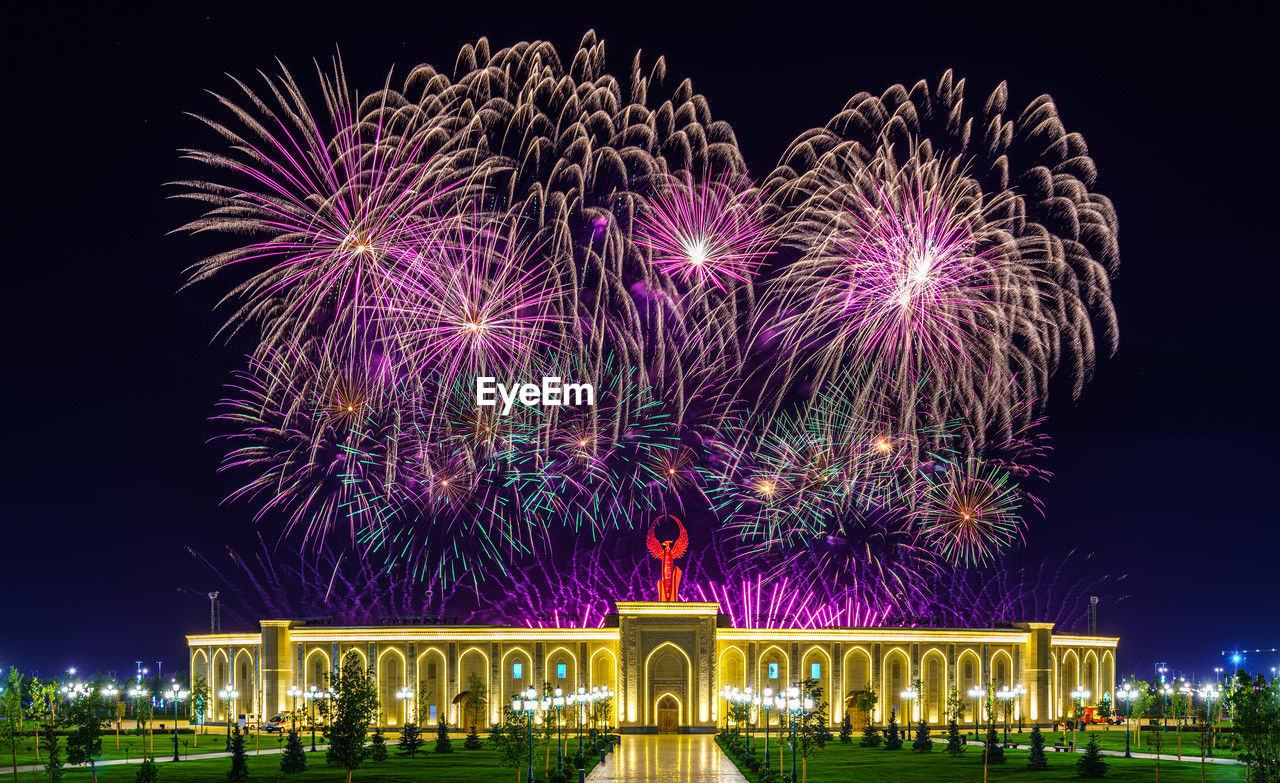 night, fireworks, illuminated, event, celebration, arts culture and entertainment, firework display, architecture, motion, sky, built structure, exploding, nature, travel destinations, new year's eve, building exterior, no people, outdoors, recreation, multi colored, city, water