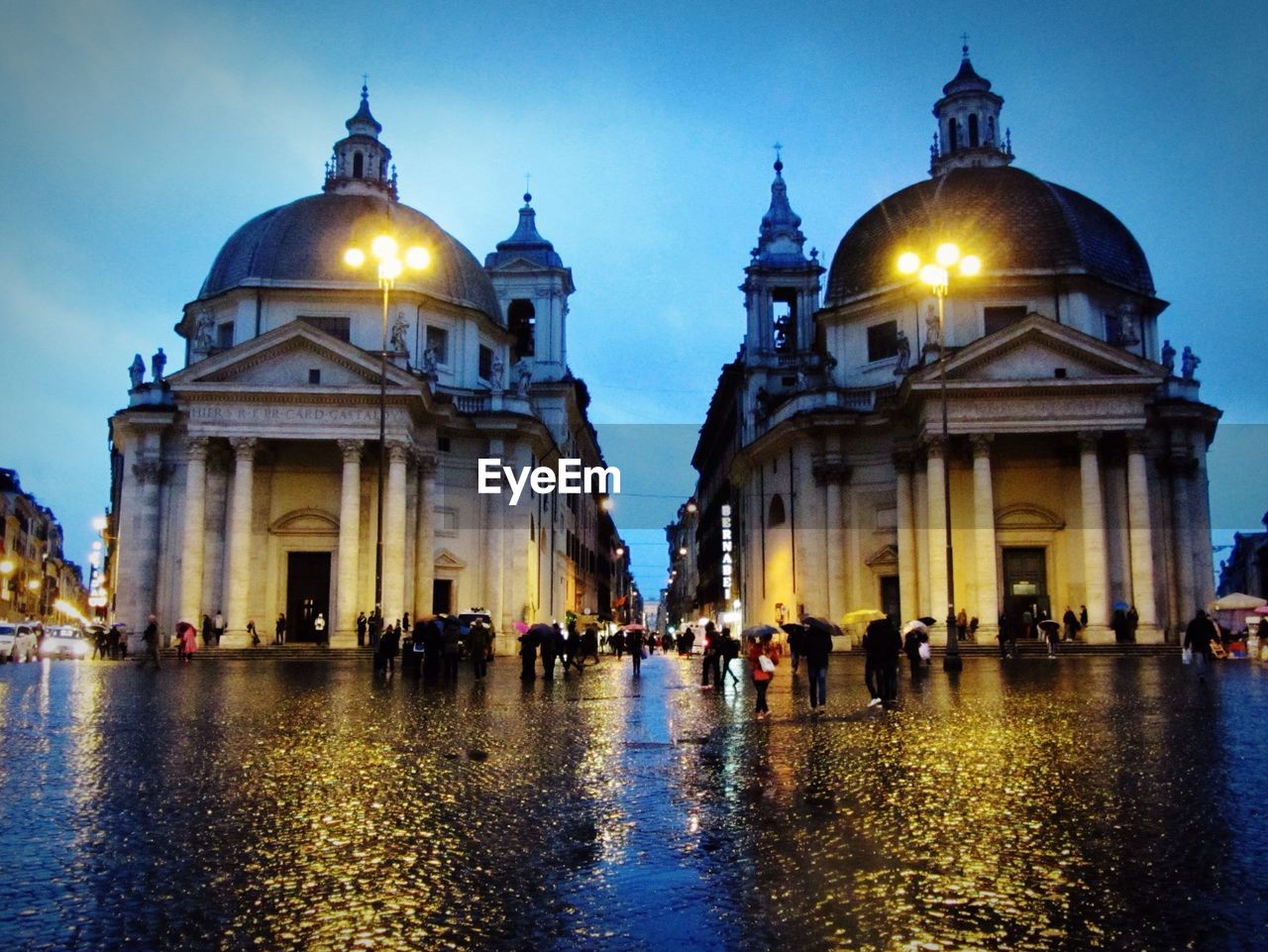 People at piazza del popolo against sky