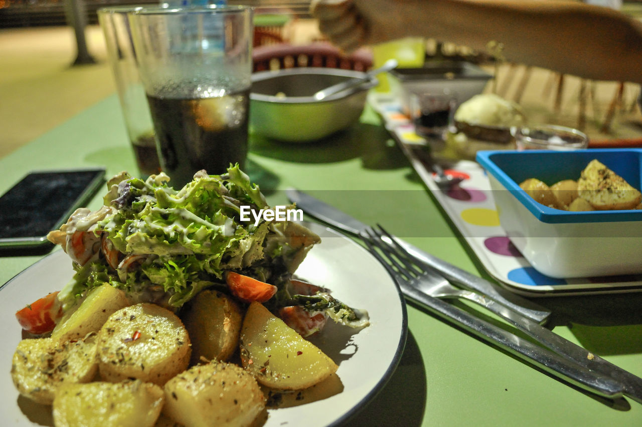 Close-up of food served on table