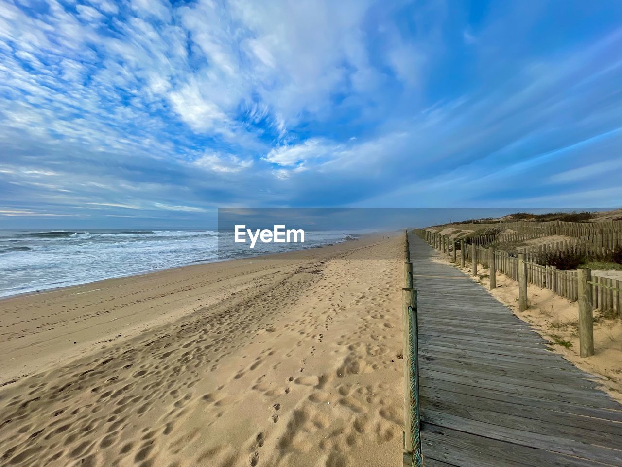 Scenic view of beach against sky