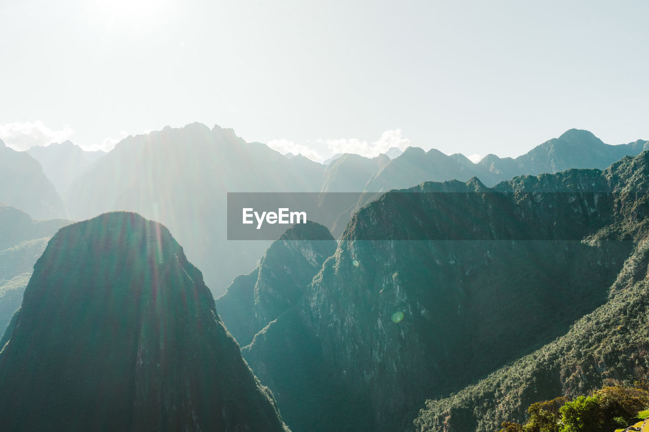 Panoramic view of mountains against clear sky