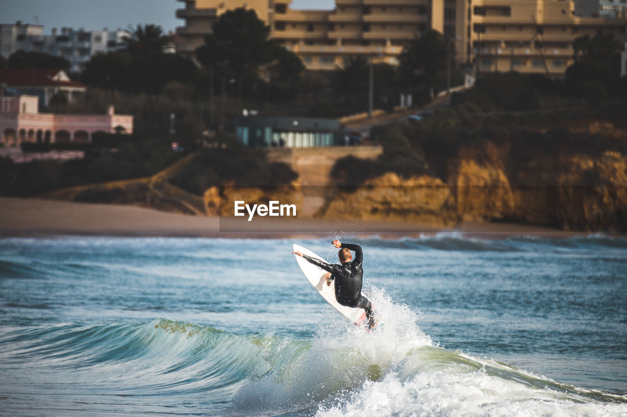 Man surfing in sea