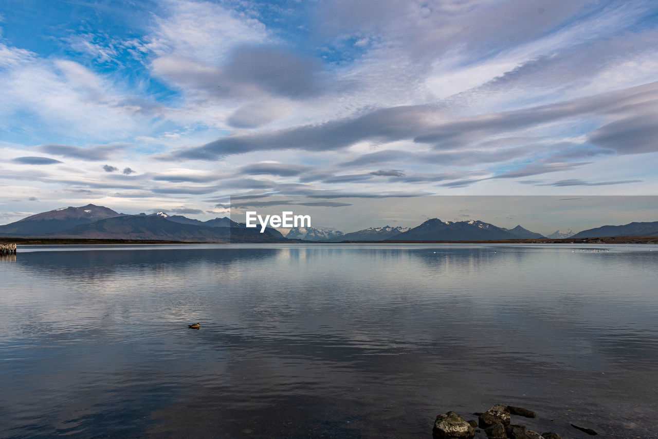 View of lake against cloudy sky