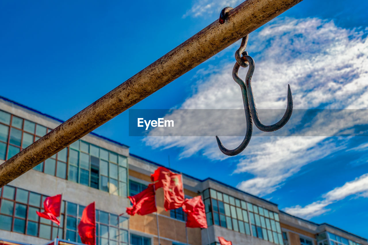 Low angle view of building against blue sky