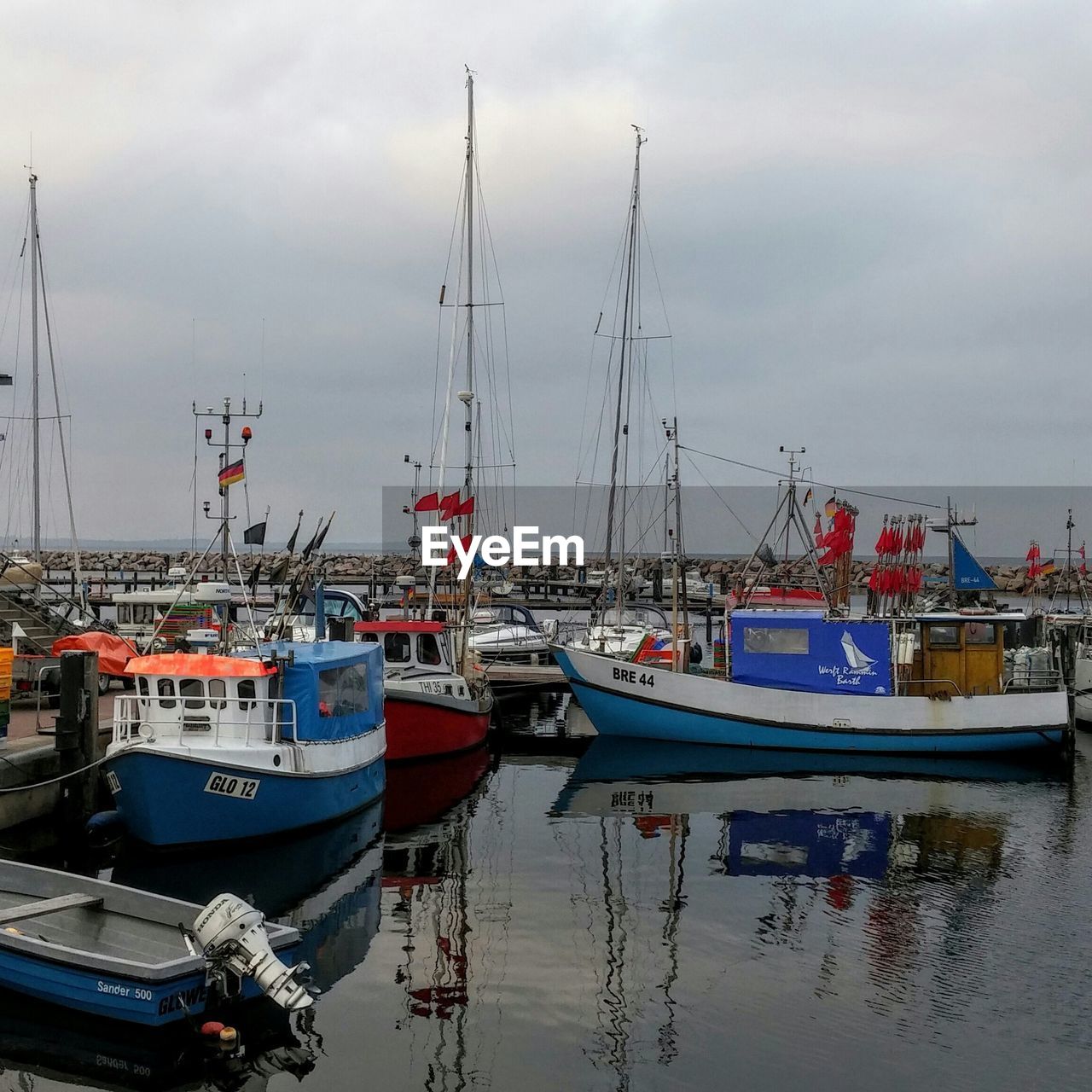 BOATS MOORED ON HARBOR