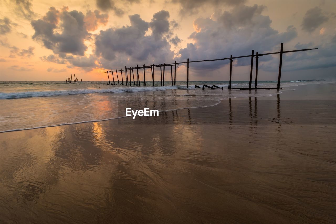 Scenic view of sea against sky at sunset