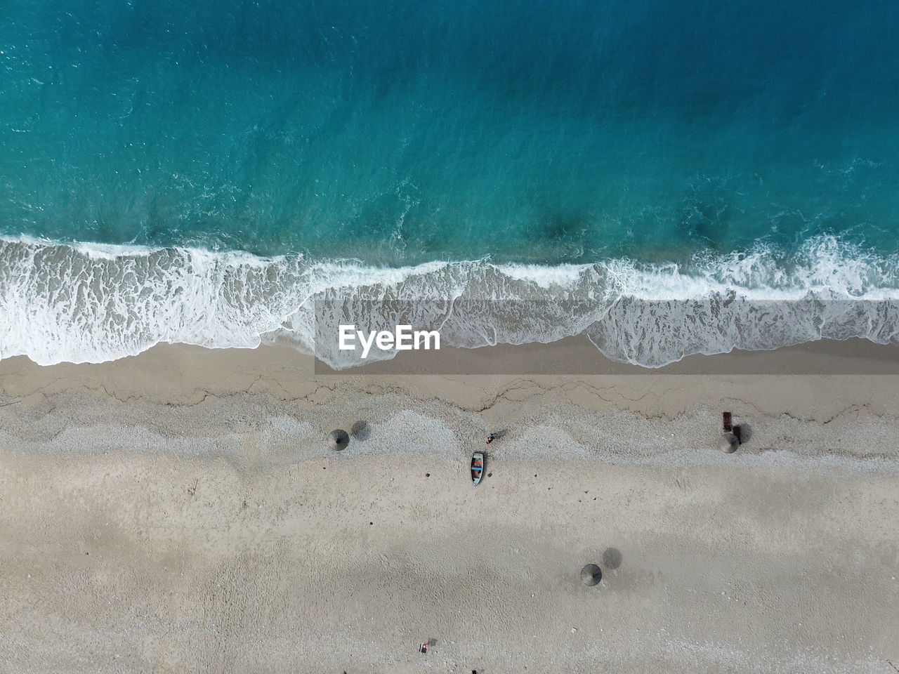 People on beach by sea