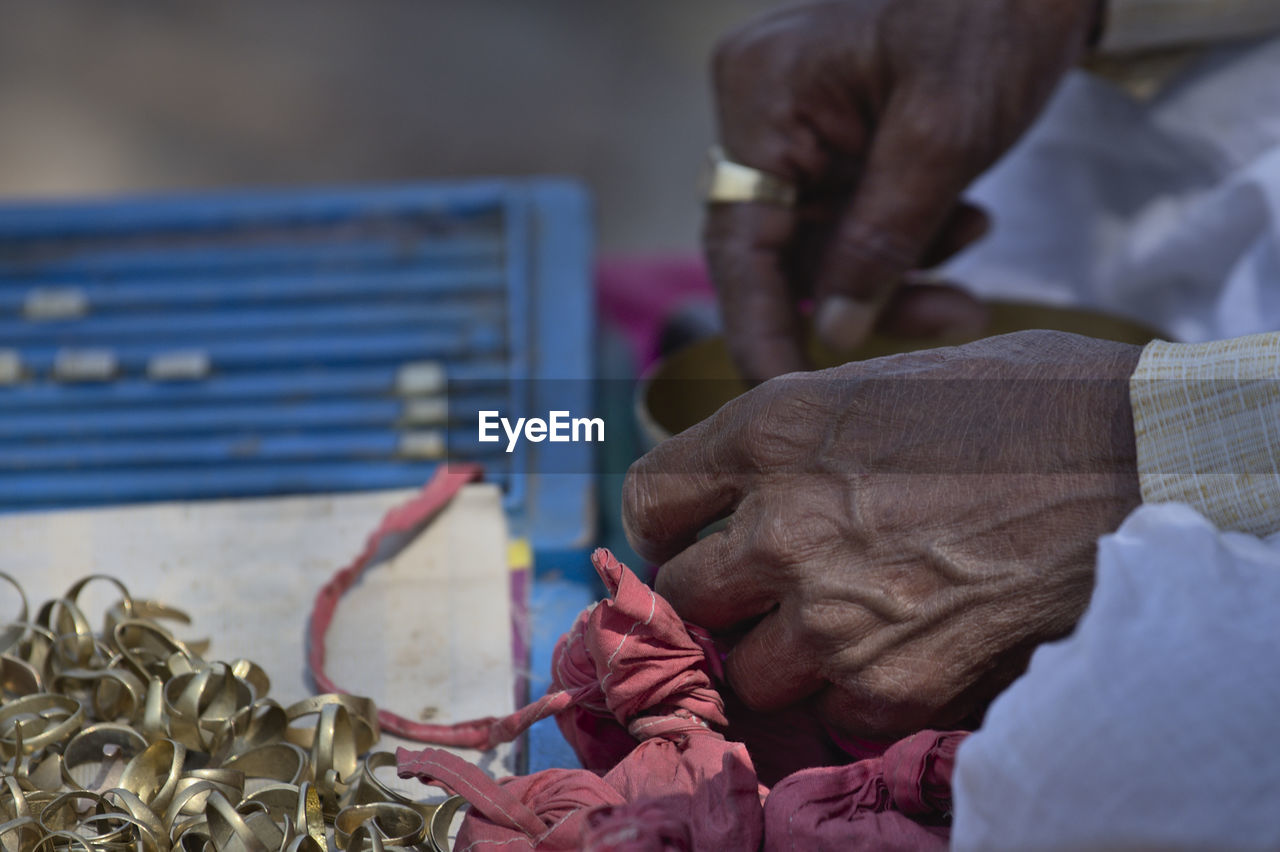 Close-up of man working on table