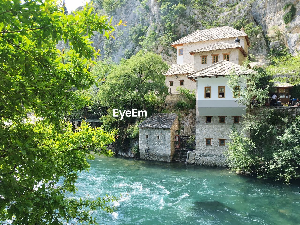 Buildings by river