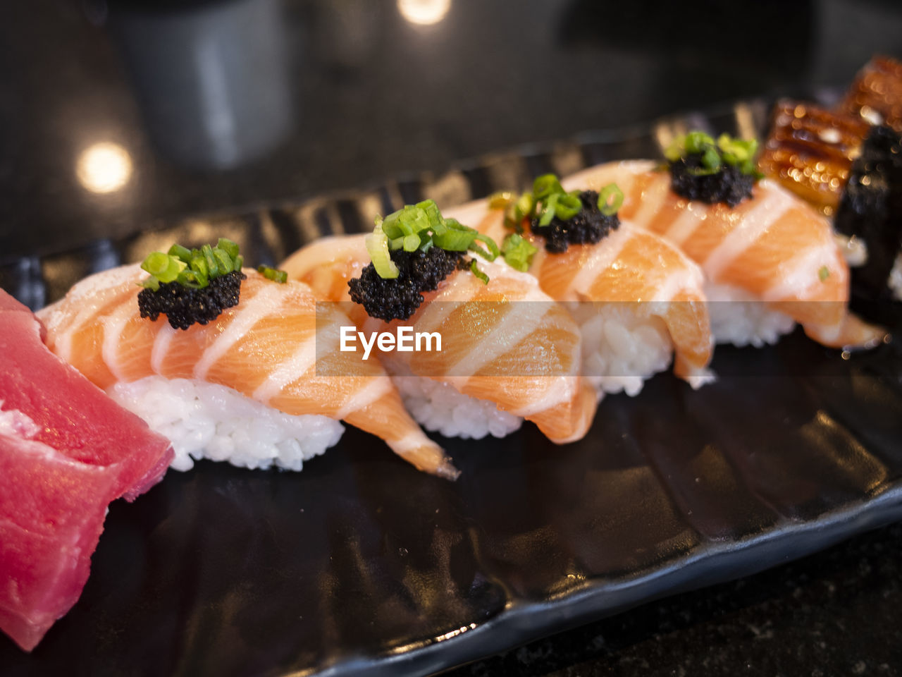 CLOSE-UP OF SUSHI IN PLATE