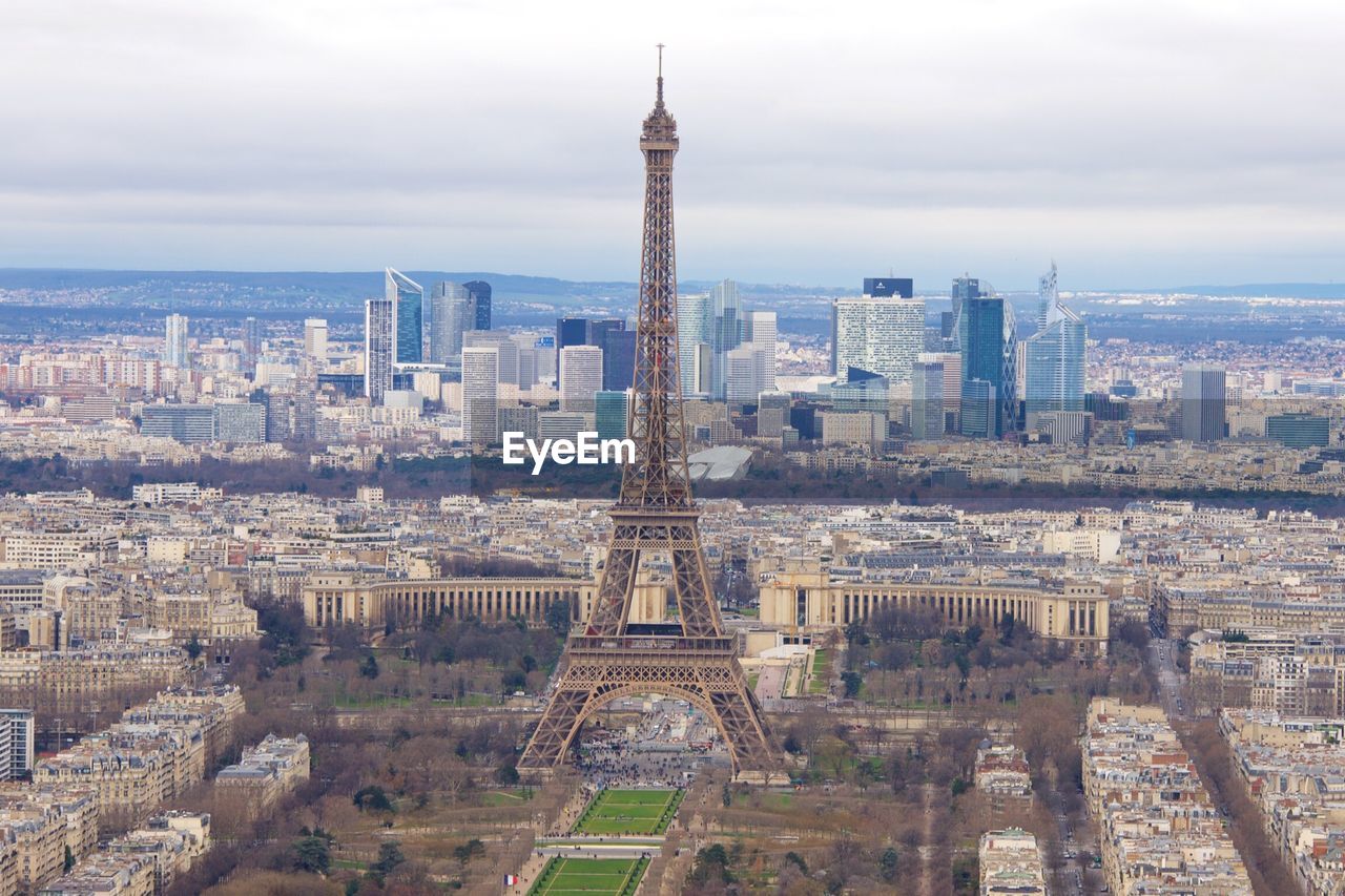 Aerial view of eiffel tower in city against sky