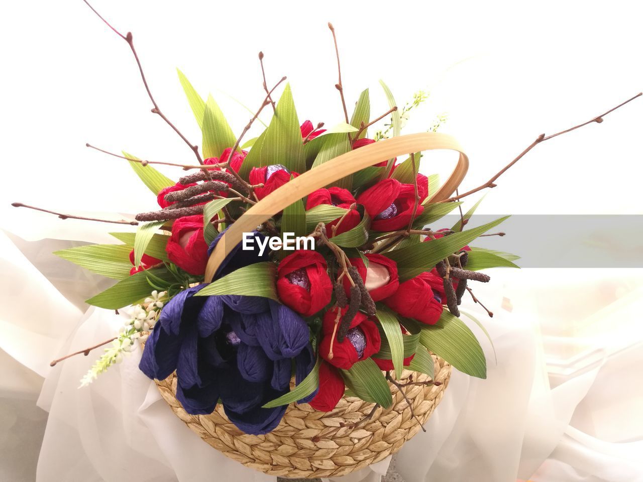 Close-up of red roses in basket