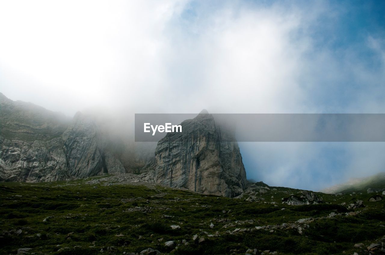 View of mountain against cloudy sky